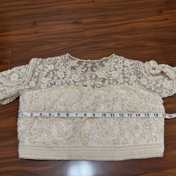 Extravagant Ivory Pearl Lehenga 🤍 - Picture 11 of 11